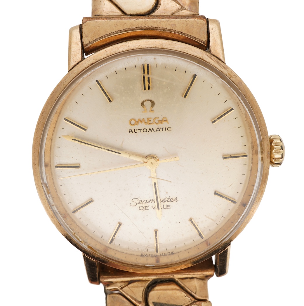 A gentleman's gold Omega Seamaster De Ville automatic wrist watch